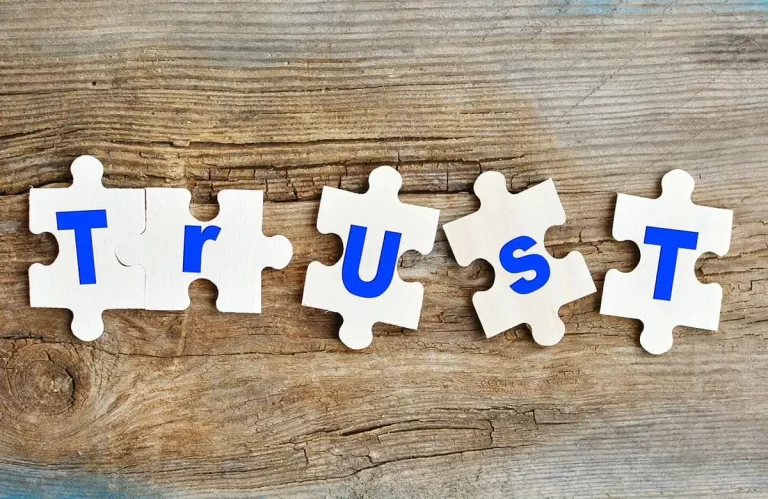 The word trust written on puzzle pieces