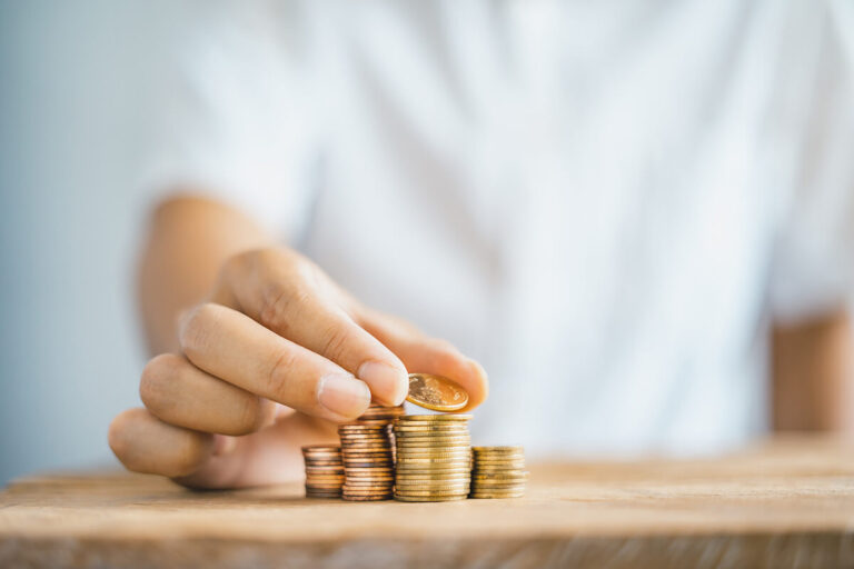 A man counting pennies